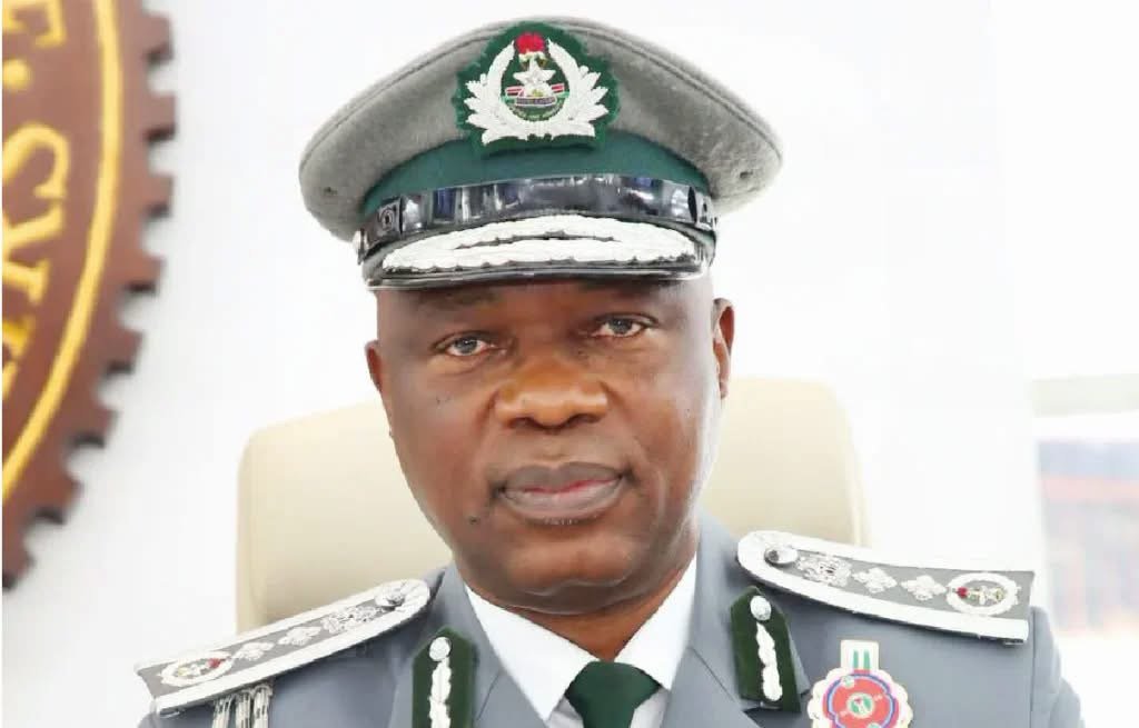 Nigeria Customs Service officials inspect 56 containers containing seized vegetable oil, used clothing and foreign tomato paste at Onne Port in Rivers State.