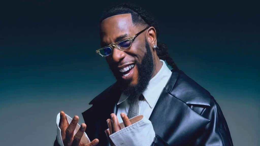 Nigerian Afrobeats star Burna Boy performing at the Stade de France ahead of his 2026 NFL Paris Game halftime show.
