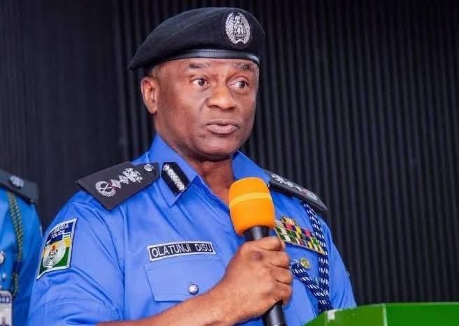 Nigeria Police personnel secure a scene in Niger State during an investigation into the deaths of 37 suspected illegal miners in NSCDC custody.