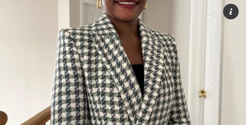 Nurse using an artificial intelligence-enabled healthcare system while reviewing patient information on a digital device.