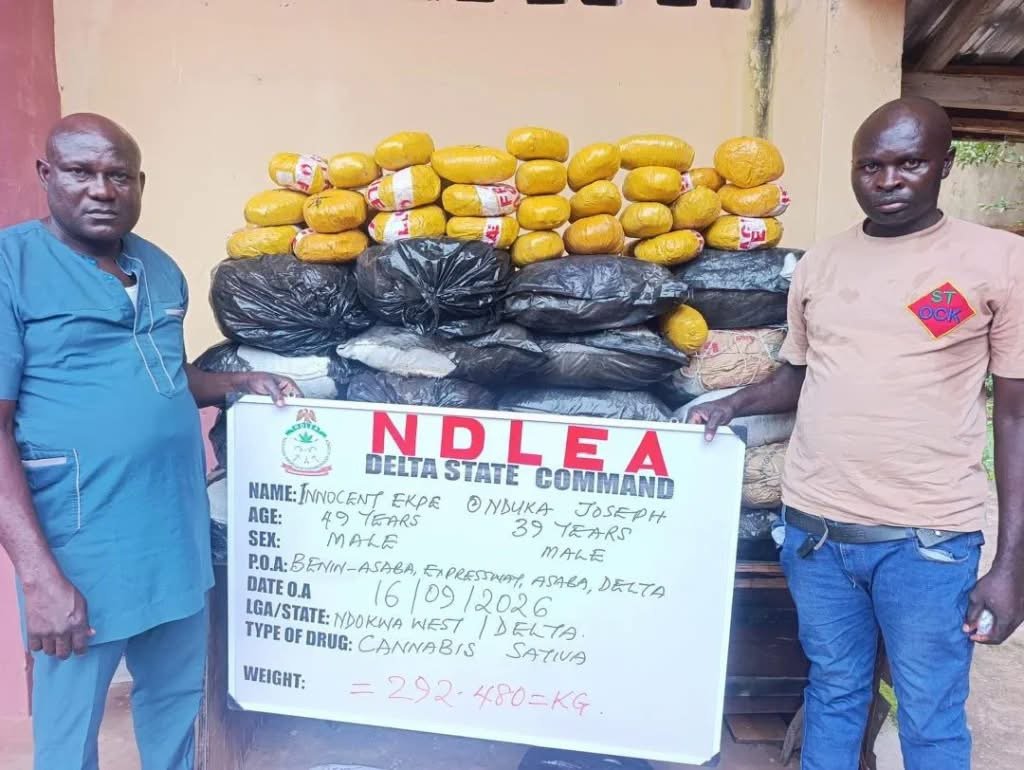 NDLEA operatives displaying seized illicit drugs during an enforcement operation in Nigeria.