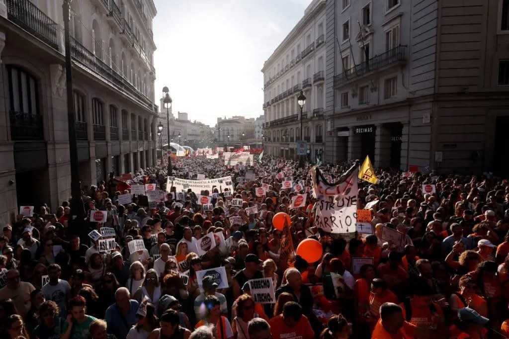 Thousands of people march in Madrid to protest the eviction of 87-year-old tenant Maricarmen Abascal and demand stronger housing protections.