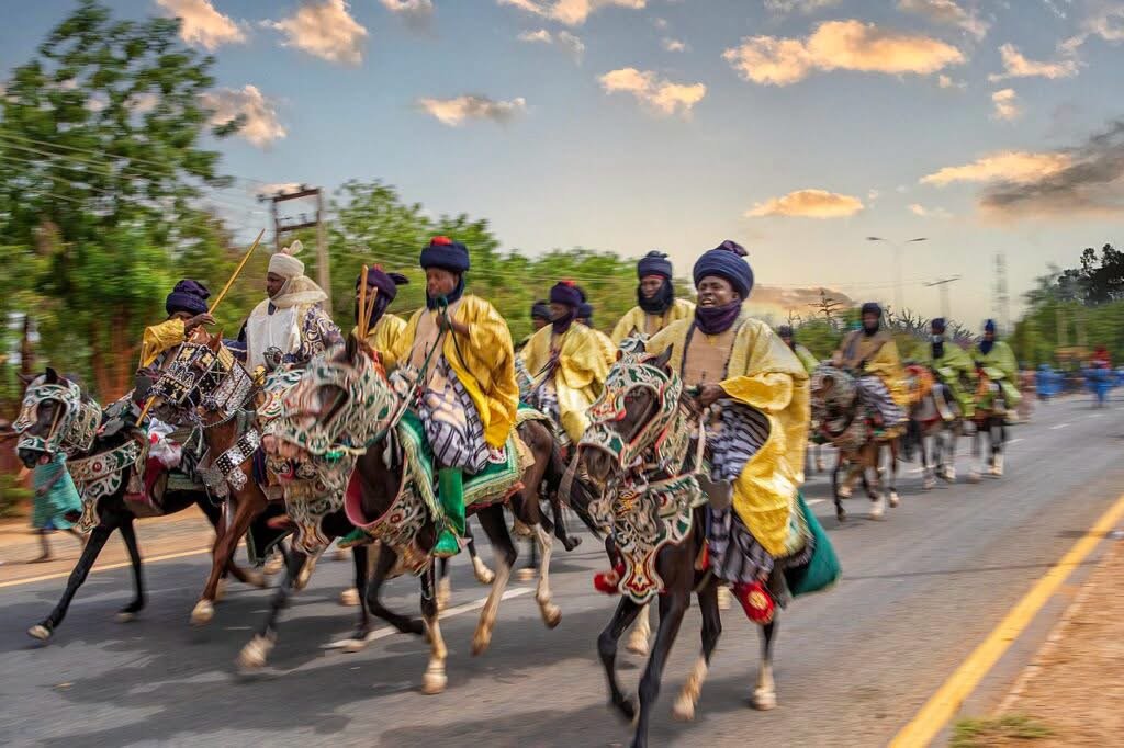 Traditional Kano Durbar horsemen riding through the city during a Sallah celebration.
