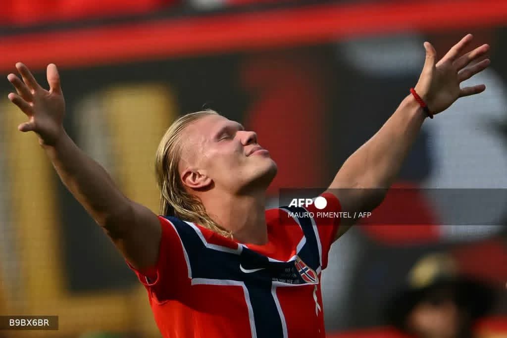 Erling Haaland of Norway celebrates after scoring an international goal during a UEFA Nations League match.
