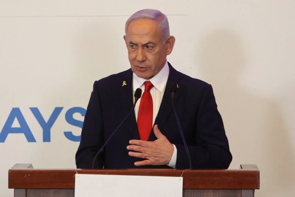 Benjamin Netanyahu addresses the United Nations General Assembly as delegates walk out during his speech defending Israel’s military action against Iran.