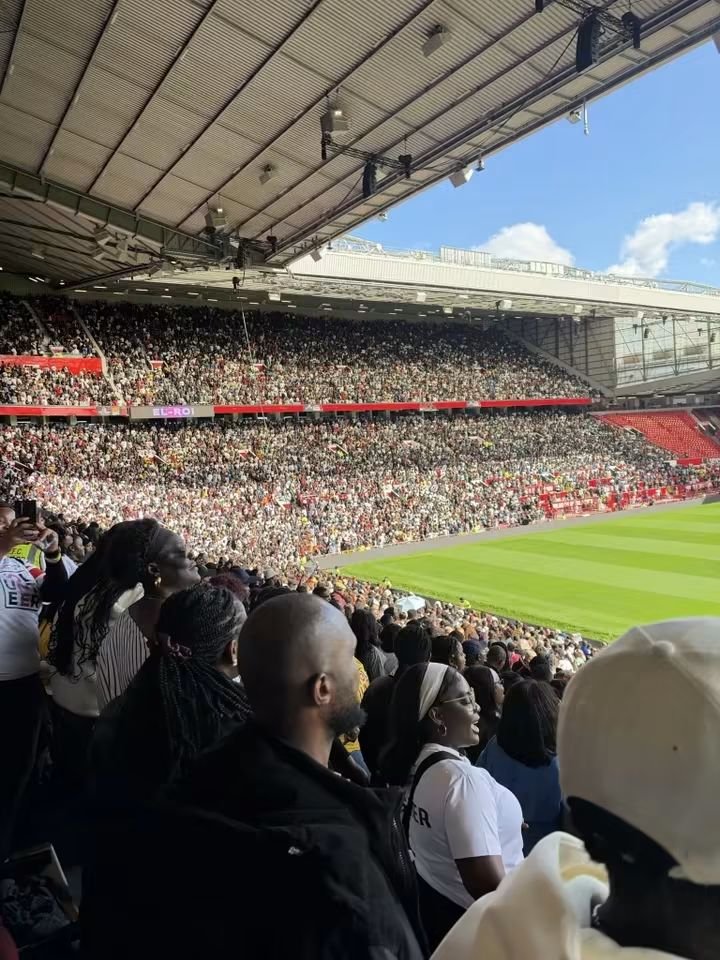 Pastor Jerry Eze leads worshippers during the NSPPD UK Prayer Conference at Old Trafford in Manchester, United Kingdom.