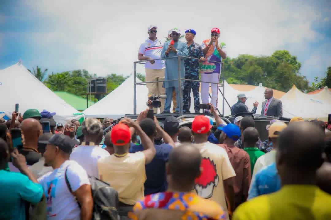 Edo State Governor Monday Okpebholo addressing residents and APC members during a visit to communities along the Benin-Abraka Road in Edo State.