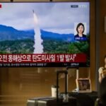 North Korean leader Kim Jong Un overseeing a reported strategic missile test during a military weapons drill.