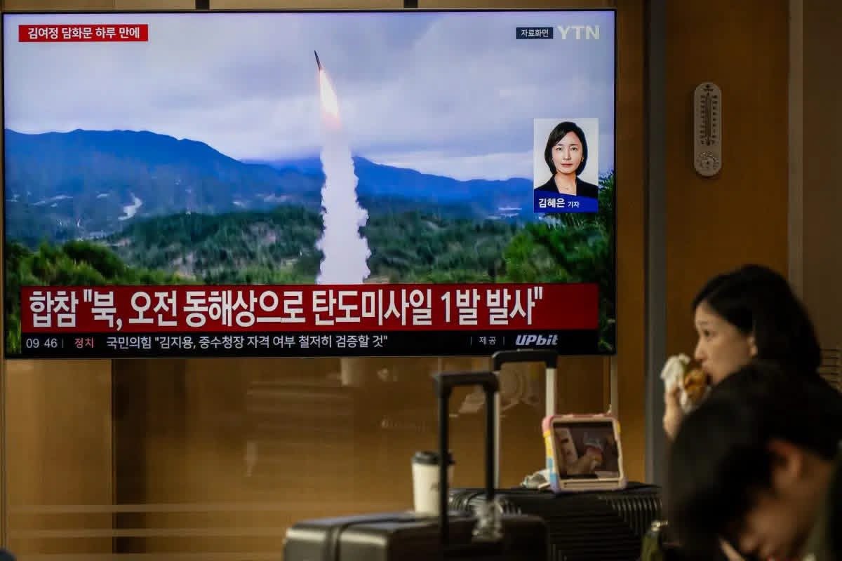 North Korean leader Kim Jong Un overseeing a reported strategic missile test during a military weapons drill.