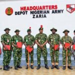 Nigerian Army officials with discharged Master Warrant Officers during a send-off ceremony at Depot Nigerian Army in Zaria, Kaduna State.