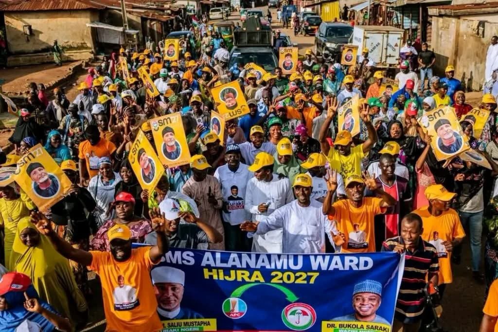 PDP leaders and supporters receiving reported APC defectors during a political mobilisation event in Ilorin West, Kwara State, ahead of Nigeria’s 2027 elections.