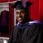 Nigerian striker Taiwo Awoniyi in academic graduation attire after completing his PFA Business School qualification while continuing his professional football career.