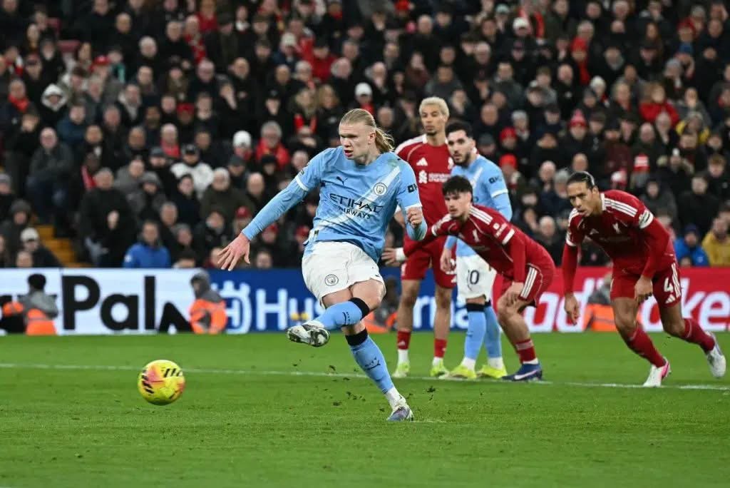 Text: Manchester City players prepare for their Premier League match against Liverpool at Anfield on October 11, 2026, following a financial rules verdict and the club’s appeal.