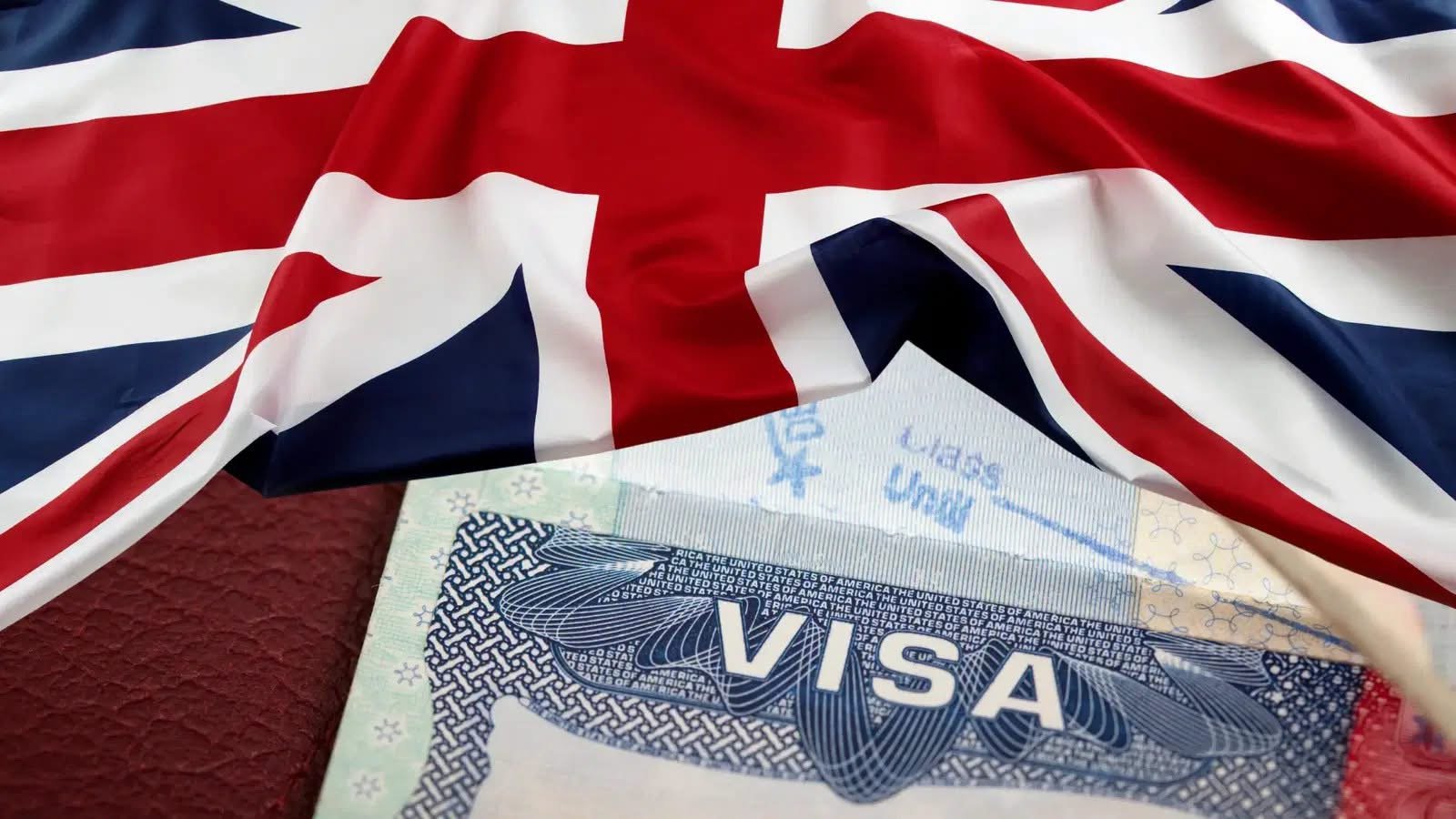 International students at a UK university campus amid reports that universities are withdrawing some admission offers to Nigerian applicants following tougher student visa compliance rules.