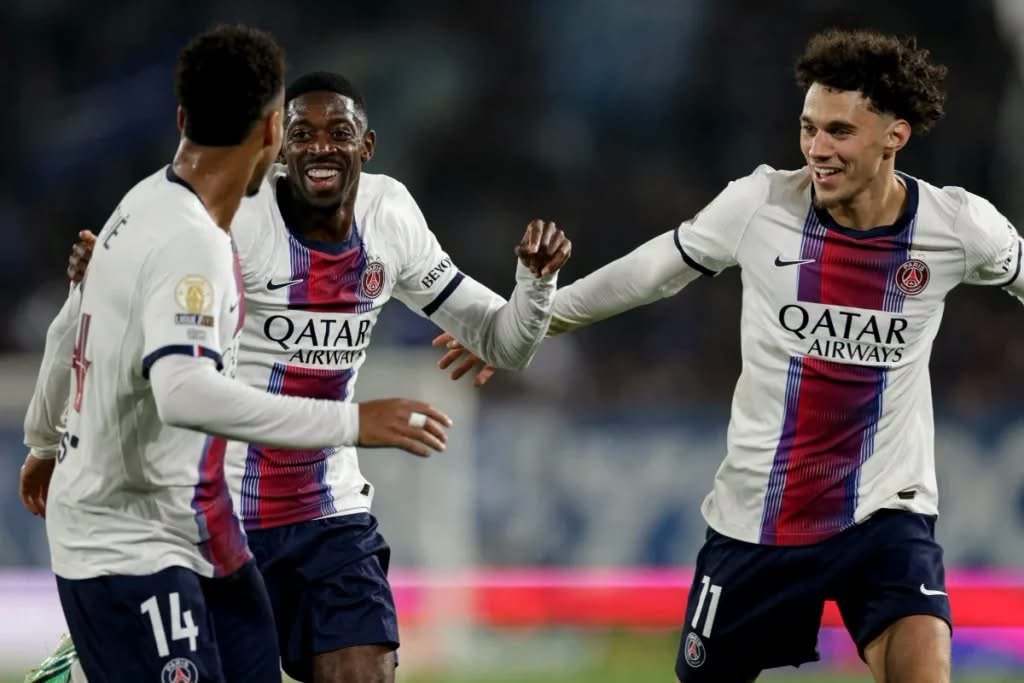 Ousmane Dembélé celebrates scoring for Paris Saint-Germain during the 3-1 Ligue 1 victory over Strasbourg at the Stade de la Meinau.