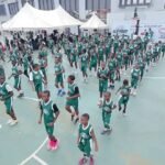 Young Nigerian basketball players take part in skills training at the third Elevate Basketball Clinic in Lagos, promoting education, sports and youth development.