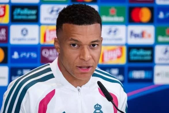 Kylian Mbappé in his Real Madrid football kit amid controversy over Chinese sponsorship agreements following a viral video referencing Mao Zedong.