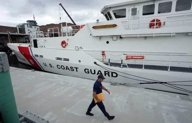 U.S. Coast Guard aircraft conducting a search for a missing medical evacuation plane off Nantucket, Massachusetts.