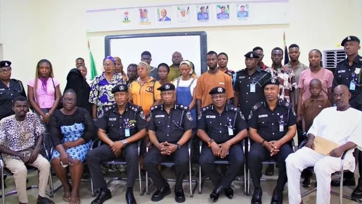 Ogun State Police Commissioner presents insurance benefit cheque to families of fallen police officers during a ceremony in Ogun State.