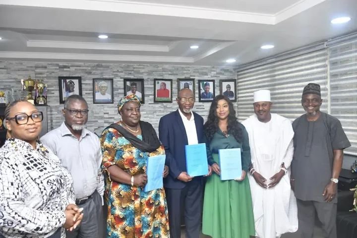 YABATECH officials and actress Bimbo Akintola at the signing of a partnership agreement to establish a Centre for Filmmaking and Production in Lagos.